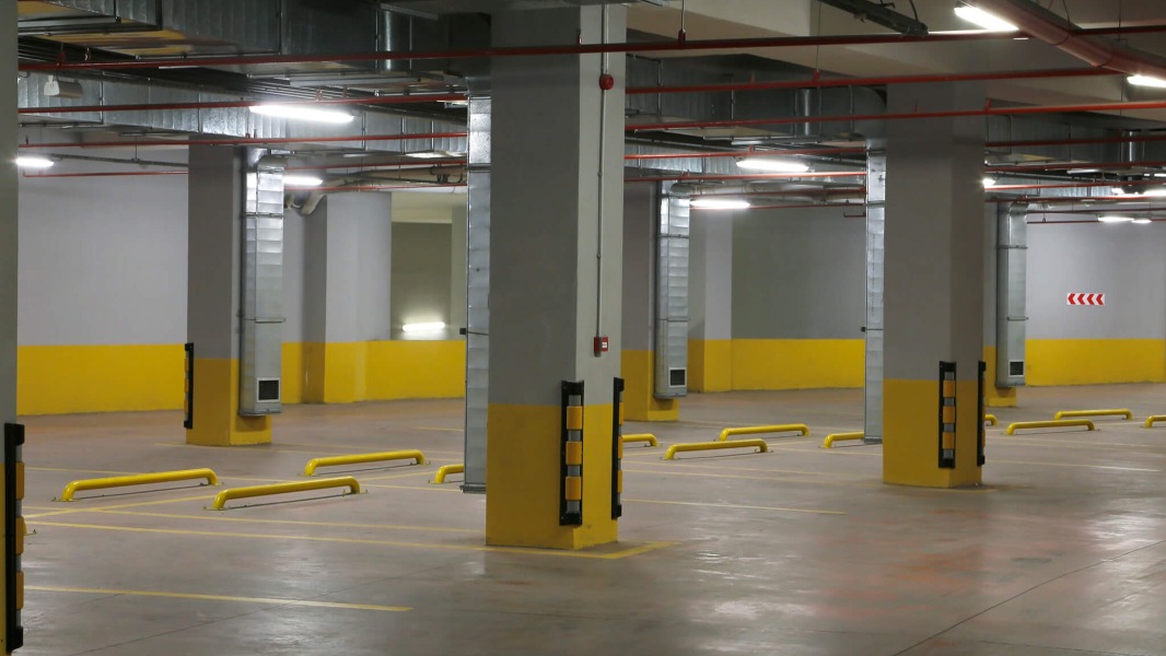 Empty parking garage with coated floor